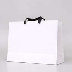 Branded paper bag with satin straps