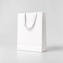 Shopping paper bag with ribbon handles