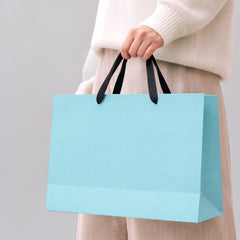 Branded paper bag with satin straps