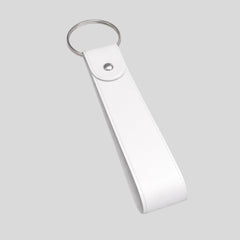Stockk White faux leather loop keychain with metal ring and snap closure. Customizable for branding.