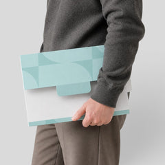 Stockka A4 cardboard envelope folder with tab closure and hanging tab, light blue and white geometric pattern.