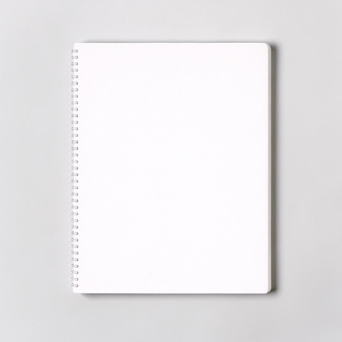 Stockka A4 softcover notebook with spiral binding and 80 lined pages, ideal for custom designs.