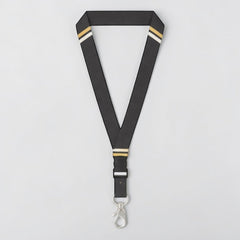 Stockka premium black polyester lanyard with gold and white stripes, detachable buckle, and metal clasp.