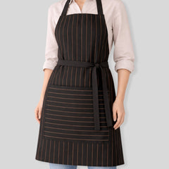 Stockka black full-length professional apron with thin copper pinstripes, large front pocket, and adjustable neck strap.