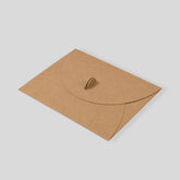 Stockka brown kraft envelope with round closure and metal clip, ideal for invitations, certificates, and branding.
