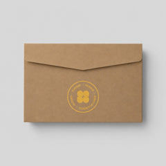 Stockka brown kraft paper envelope with a straight back flap and a yellow circular logo print for professional use.