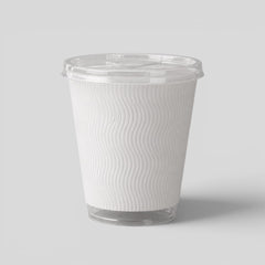 Stockka clear narrow plastic cup with textured white sleeve and flat lid, ideal for iced tea and cold brew.