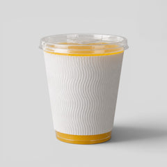 Stockka narrow clear plastic cup with flat lid and white wave textured sleeve, filled with orange juice.