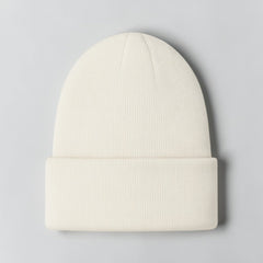 Stockka cream acrylic knit beanie with a folded cuff, perfect for winter warmth and style.