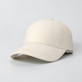 Stockka classic baseball cap in cream cotton with a blue asterisk logo. Adjustable unisex fit.