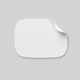 Stockka white custom shape sticker with rounded corners, ideal for branding products and packaging.