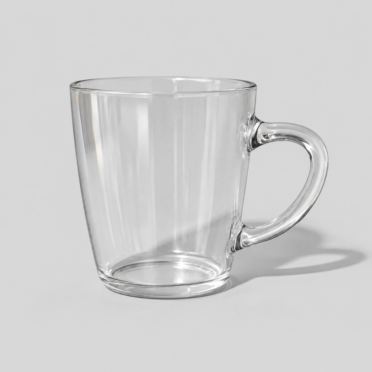 Stockka clear glass mug with a wide, flared design and 475ml capacity, perfect for lattes and tea.