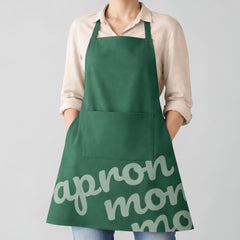 Stockka standard green polyester-cotton blend apron with front pocket and text graphic.