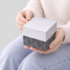 Stockka grey and silver cubic jewelry box with removable lid, matte finish, geometric pattern on base.
