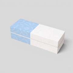 Stockka luxury gift box with magnetic closure, half light blue with pattern, half white. Ideal for jewelry.