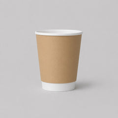 Stockka natural kraft paper cup with white rim and sleeve, ideal for espresso or tea.