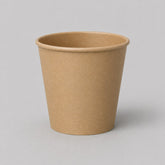 Stockka small minimalist brown kraft paper espresso cup with PE coating, ideal for short espressos or tastings.