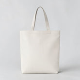 Stockka natural cotton canvas tote bag with a geometric lavender pattern on the bottom half.