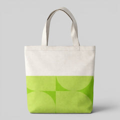 Stockka natural cotton canvas tote bag with a geometric lime green pattern. Ideal for everyday use or custom branding.