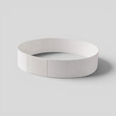 Stockka white paper wristband with smart adhesive closure for events, parties, and festivals. Water and tear resistant.