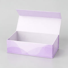 Stockka classic magnetic gift box with a hinged lid, in light purple with a subtle wave pattern. Made of rigid cardboard with matte coated paper.