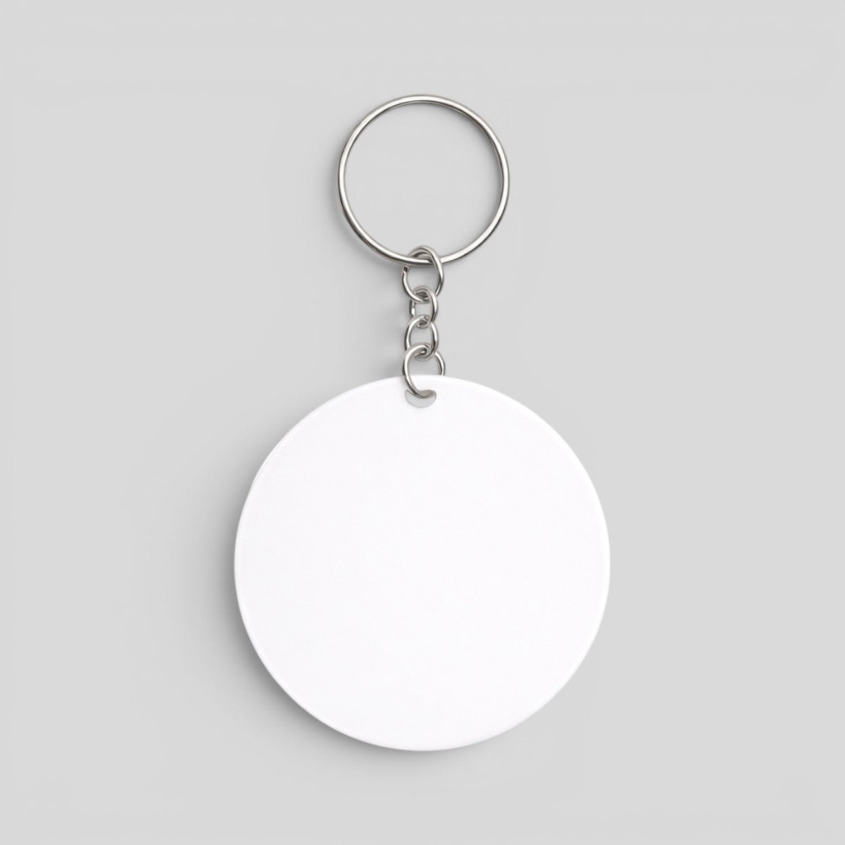 Stockka customizable round acrylic keychain with shiny finish and metal chain. Ideal for promotional branding or gifts.
