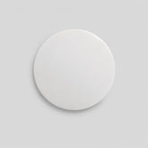 Stockka white round custom logo sticker, 80-90 GSM coated paper sticker for branding products, packaging, and shipping.