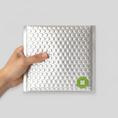 Stockka silver padded bubble mailer, 4.5x7.0 cm, with strong adhesive strip and "Thank You For Your Order" sticker.