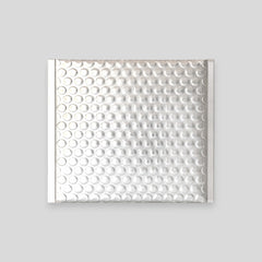 Stockka silver padded bubble mailer, 4.5x7.0 cm, with secure adhesive strip for small items like jewelry.