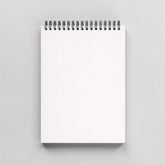 Stockka top spiral notebook with 80 lined pages and soft cover. Customizable green design.