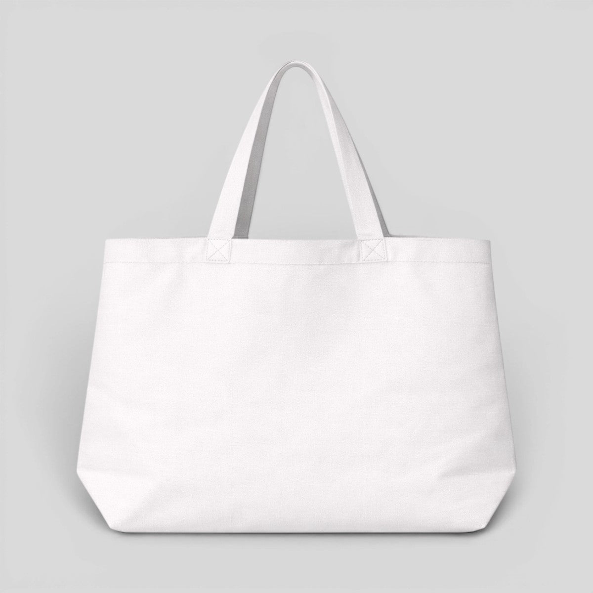 Stockka white canvas tote bag with long handles, perfect for everyday use or custom printing.