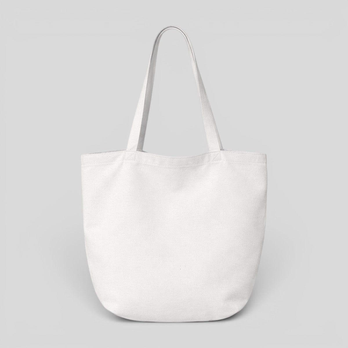 Stockka white canvas tote bag with long shoulder straps, perfect for everyday use or branding.