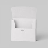 Stockka white matte coated cardboard box with front opening and internal tabs for secure closure. Ideal for marketing kits or small product sets.