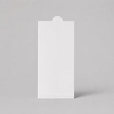 Stockka vertical white matte cardboard envelope with rounded tab closure for gift certificates, cards, or narrow documents.