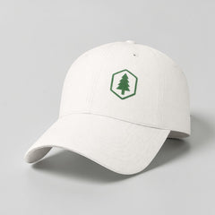Stockka white cotton twill baseball cap with green tree logo and velcro closure