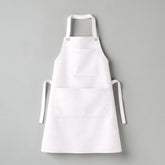 Stockka white full-length apron with two pockets, made of durable cotton-polyester blend, ideal for kitchen, workshop, or cafe use.