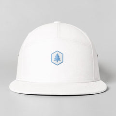 Stockka white 100% cotton urban cap with blue tree logo, adjustable unisex fit.