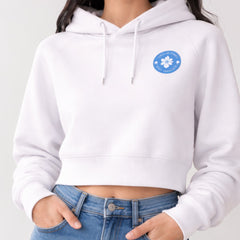 Stockka white cropped cotton fleece hoodie with raglan sleeves and adjustable drawstring. Features a small blue circular logo on the chest.