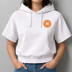 Stockka white cotton short sleeve cropped hoodie with drawstring and orange graphic.