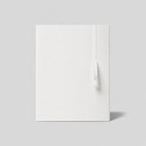 Stockka elegant white corrugated cardboard document folder with a unique tear-off zipper closure for important papers.