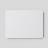 Stockka white fabric mouse pad with rounded corners and stitched edges, ideal for smooth mouse movement.