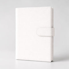 Stockka white faux leather notebook with magnetic closure, 80 lined pages, and customizable cover.