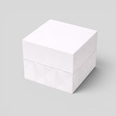 Stockka white cubic jewelry box with removable lid, matte finish, geometric pattern on base.