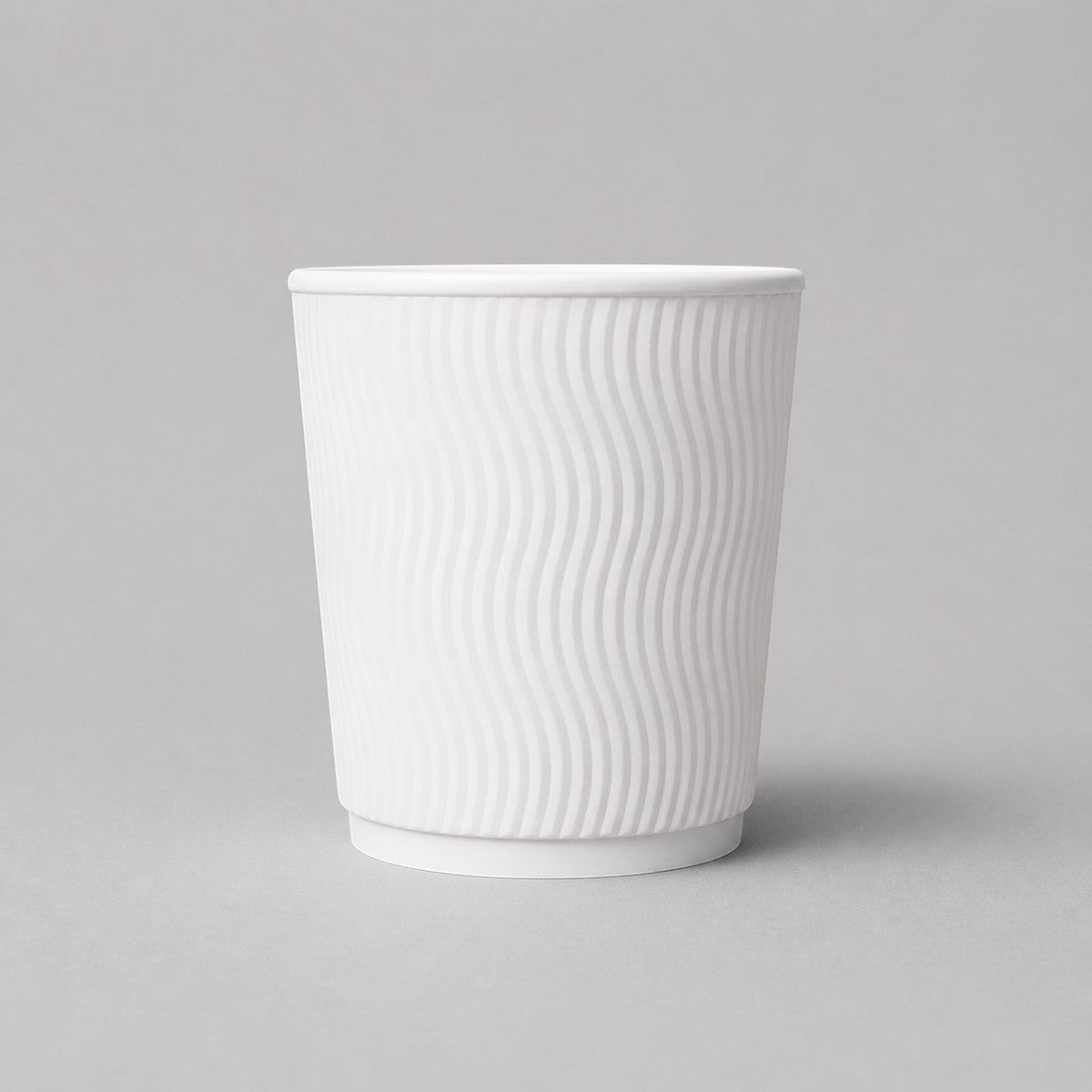 Stockka medium white kraft paper cup with insulated ripple walls, no lid. Ideal for office coffee or medium hot drinks.
