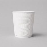 Stockka medium white kraft paper cup with insulated ripple walls, no lid. Ideal for office coffee or medium hot drinks.