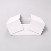 Stockka white matte finish rigid cardboard gift box with magnetic closure and double-wing opening.