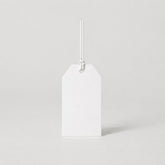 Stockka classic white paper hang tag with reinforced hole and string, ideal for clothing and retail.