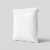 Stockka white plastic mailing bag with self-adhesive strip for shipping and online stores.