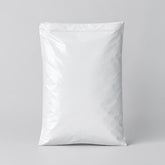 Stockka white vertical poly mailer bag with self-adhesive strip, made of durable LDPE plastic for shipping online orders.