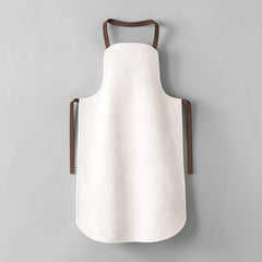 Stockka modern full-length apron in white polyester twill with rounded hem and dark brown straps.